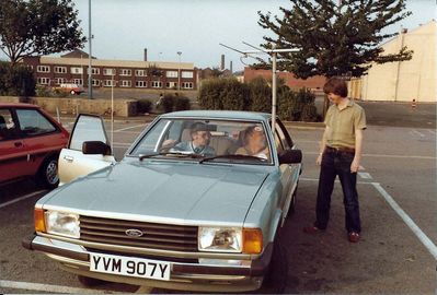 Foxhunt  August 9th 1983  Lawrence, G4KLT standing
with G4GSY driving..John Maude (?)  passenger
Photo from G3VNQ/NM9J
